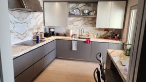 Modern Custom Kitchen with Marble Backsplash