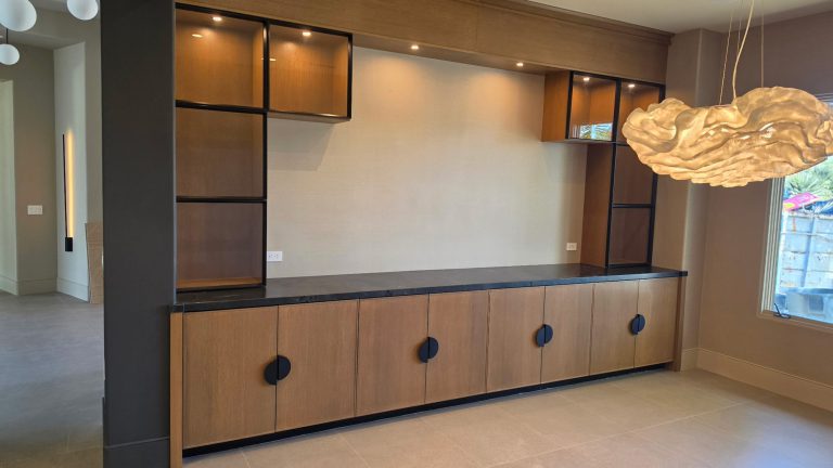 Rift White Oak Cabinetry with Black Glass Doors
