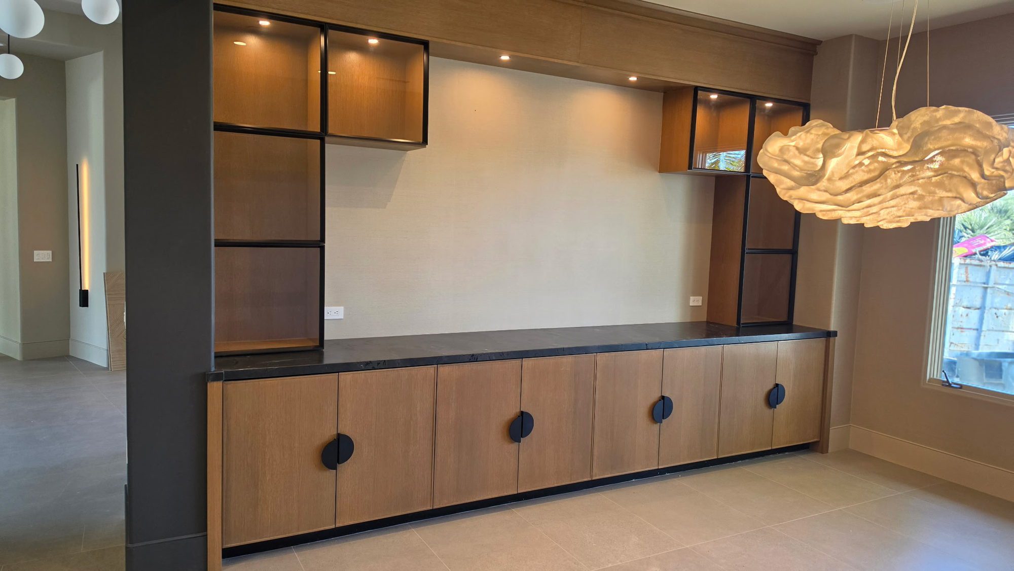 Rift White Oak Cabinetry with Black Glass Doors